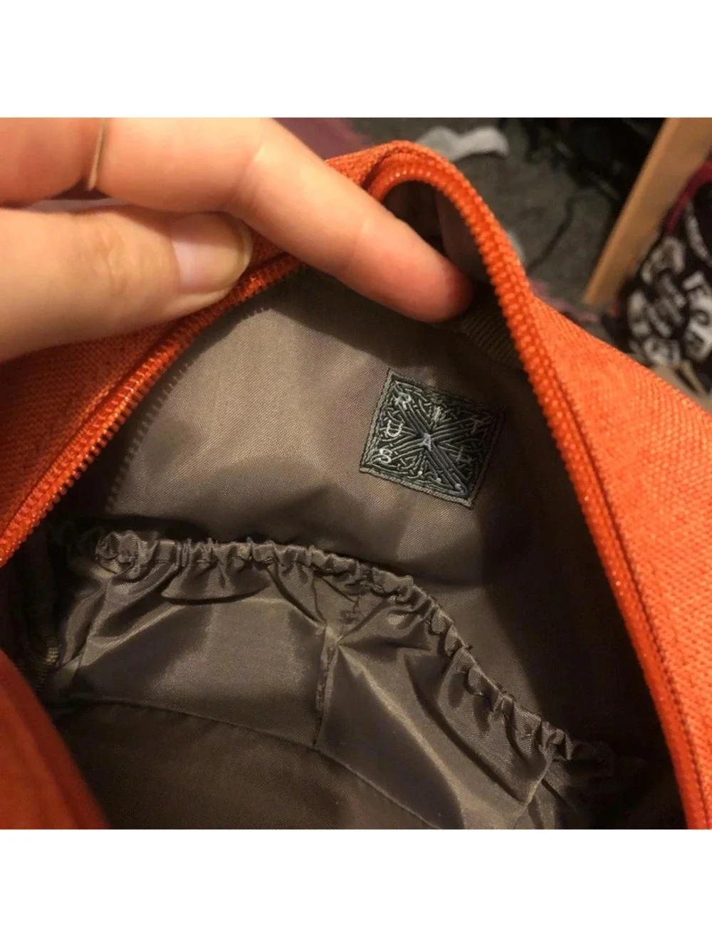 Brand new orange rituals make up bag
